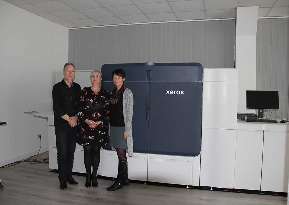 Staff of mediencenter RAUSCH with their Xerox Iridesse Press