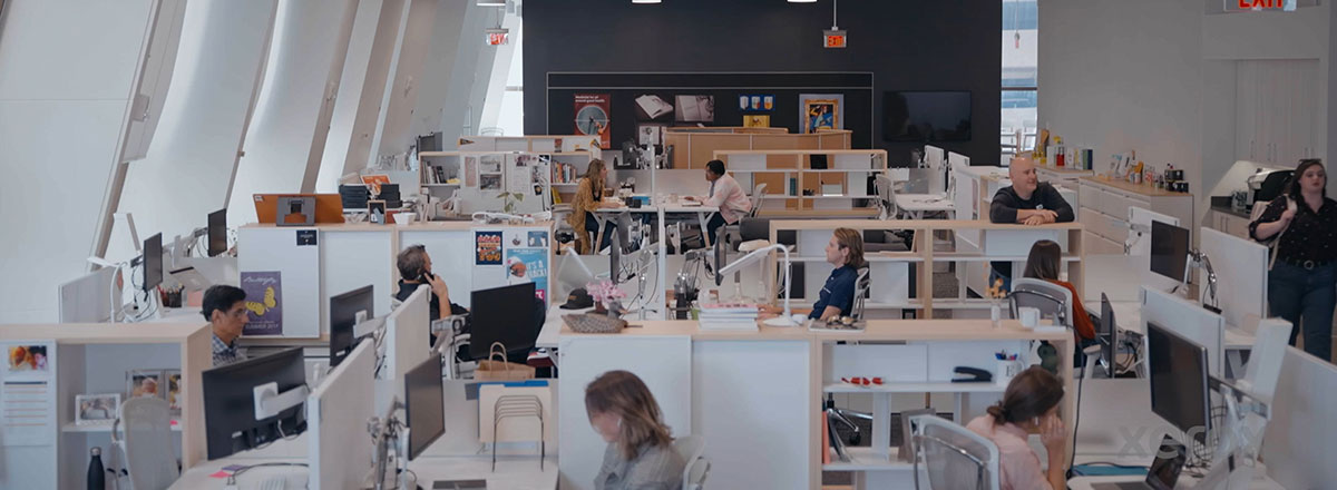 Overhead view of a busy office with cubicles