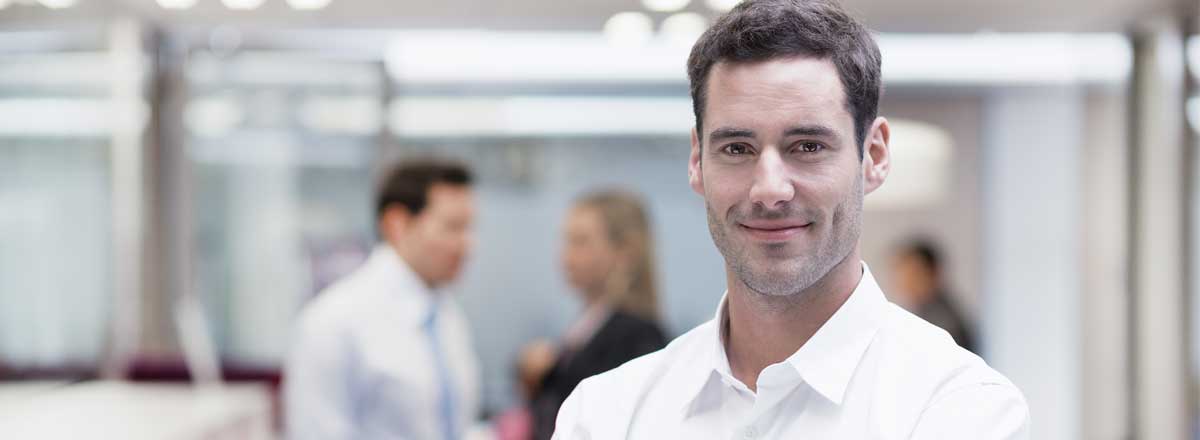 Smiling man in an office