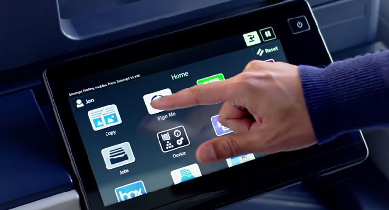 Person using the Sign Me app on a Xerox ConnectKey user interface