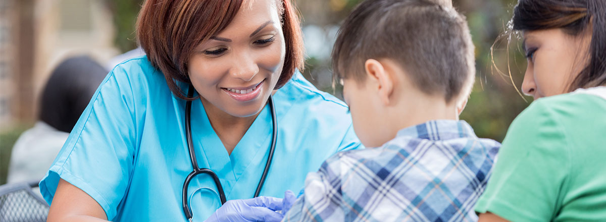 Doctor examining a child