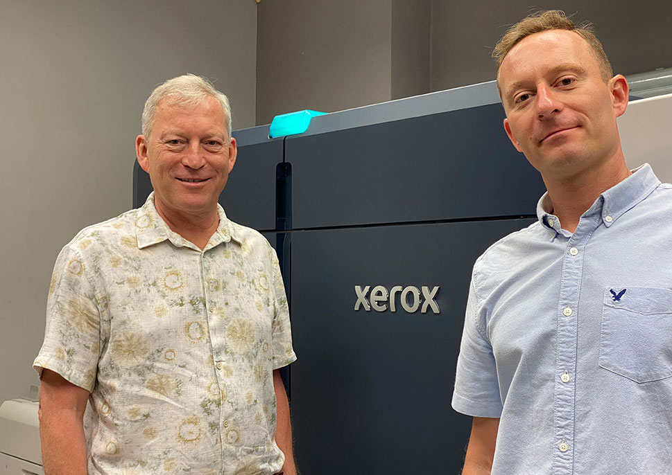 Wojciech Pawlowski & Marcin Pawlowski of Badge4U with their Xerox Iridesse Press
