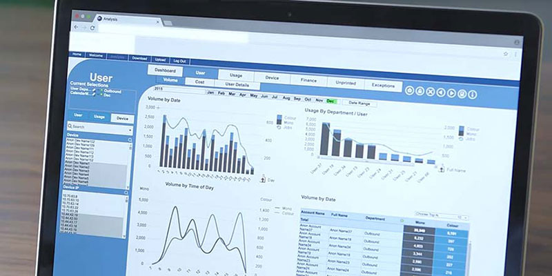 Laptop screen showing graphs and charts