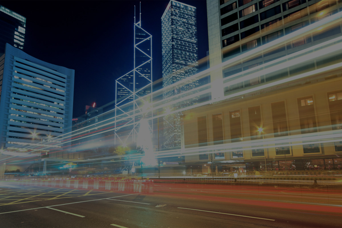 City street at night with blurred rays of light