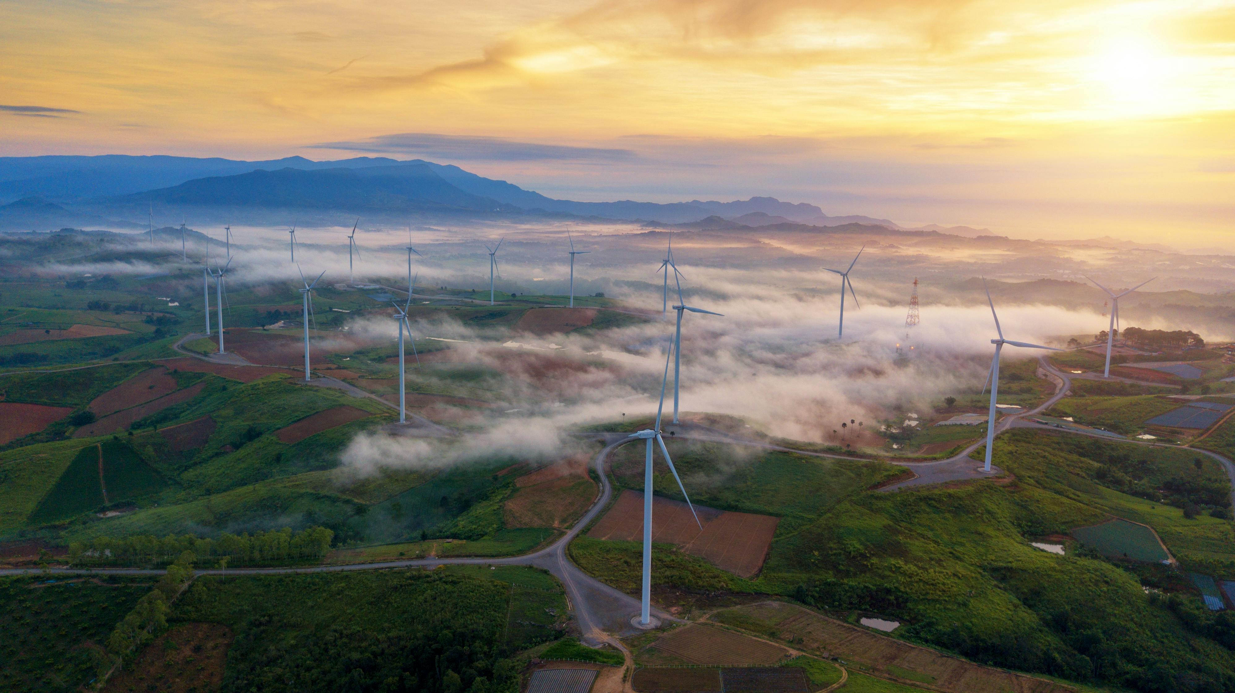 Wind turbines in green landscape