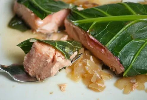 Photo of salmon steamed in collard greens.