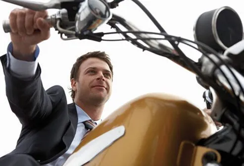 A man taking time for himself on his motorcycle.