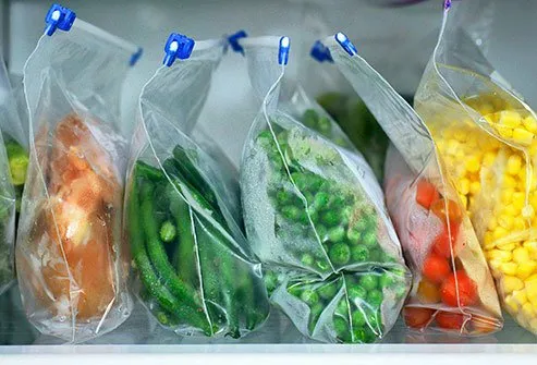 You can save space if you use large re-sealable plastic bags and squeeze out any extra air.