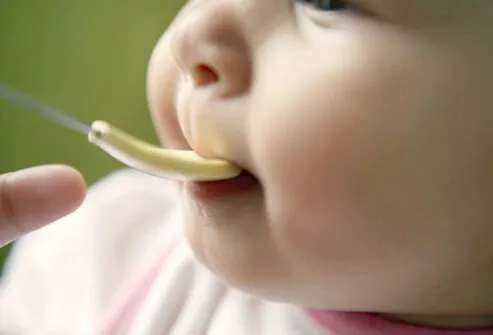 It may seem like it’s something natural, but being fed by a spoon is new to your baby.