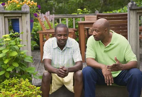 A man talks to his son.