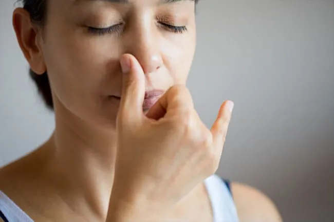 Use your thumb to close one nostril while you breathe through the other, then switch. 