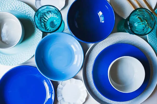 Believe it or not, using blue plates and dishes might reduce how much food you serve yourself.