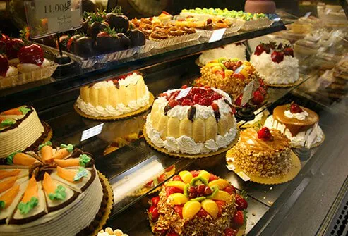 Bakery display of cakes, pies, cookies, and treats.