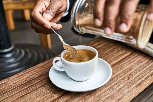 Adding sugar and flavorings to coffee is a bad idea because it adds extra calories. 