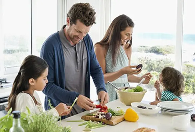 A family preparing a healthy meal.