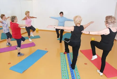 Senior women taking a balance exercise class.