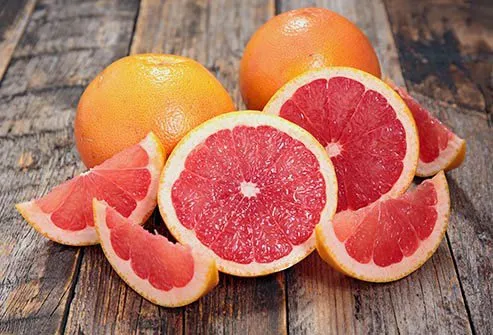 Sections and halves of grapefruit