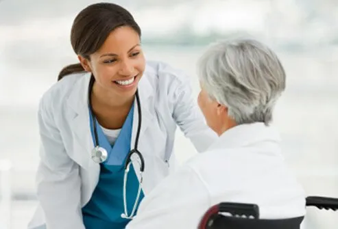 A doctor meets with a patient for follow-up care.