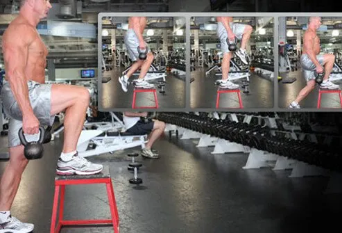 Photo of a man doing a step-up, step-down with a kettlebell for muscle confusion.