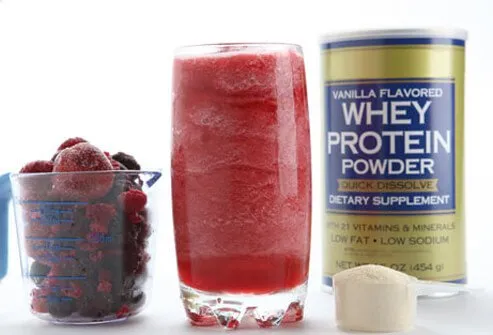 Photo of smoothie with whey protein and frozen berries.