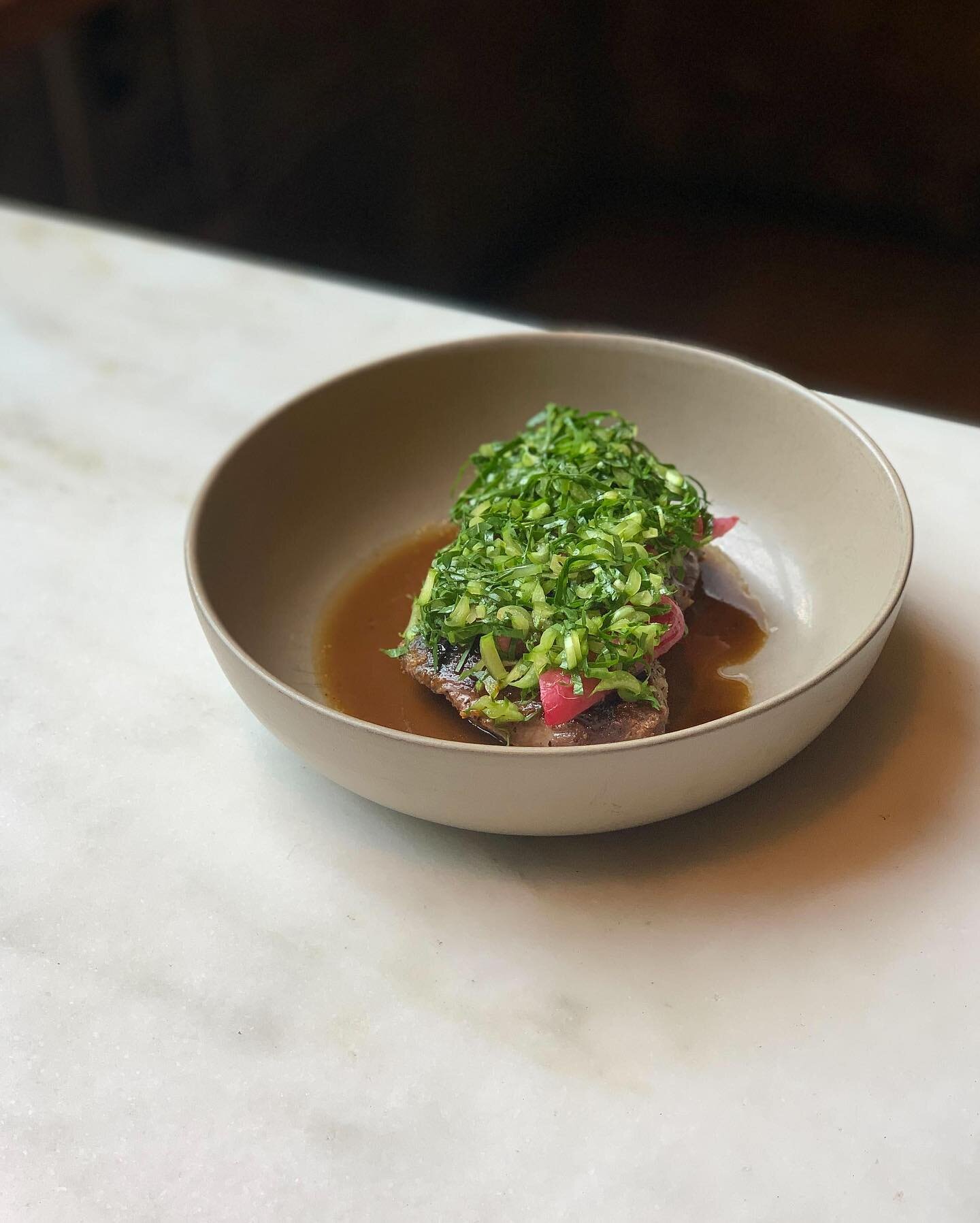 Heritage pork collar, black truffle, braised radish, dandelion greens