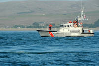 A crew aboard a 47-foot motor lifeboat, from Station Bodega Bay await the next drill during a multi-agency training exercise in California.