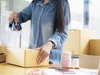 woman packing up a box