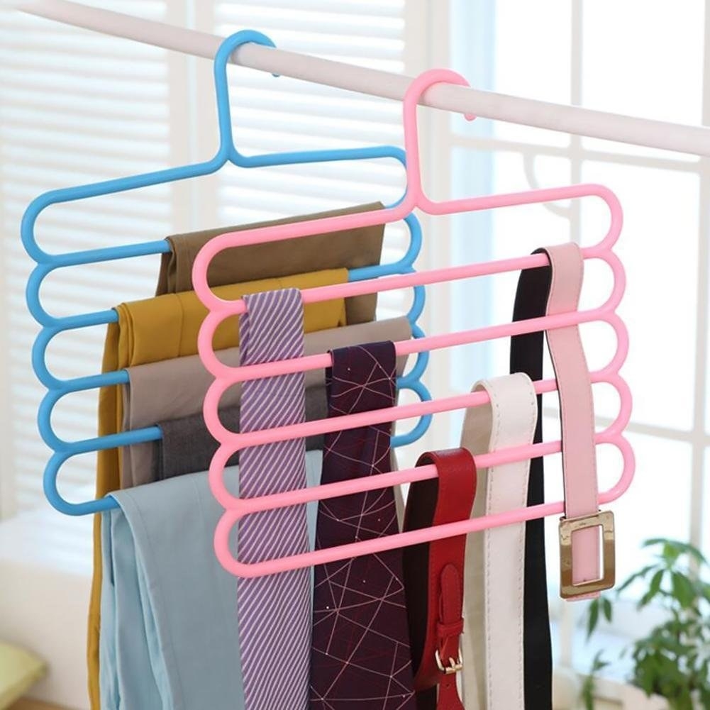 Hangers with 5 layers with clothes on them