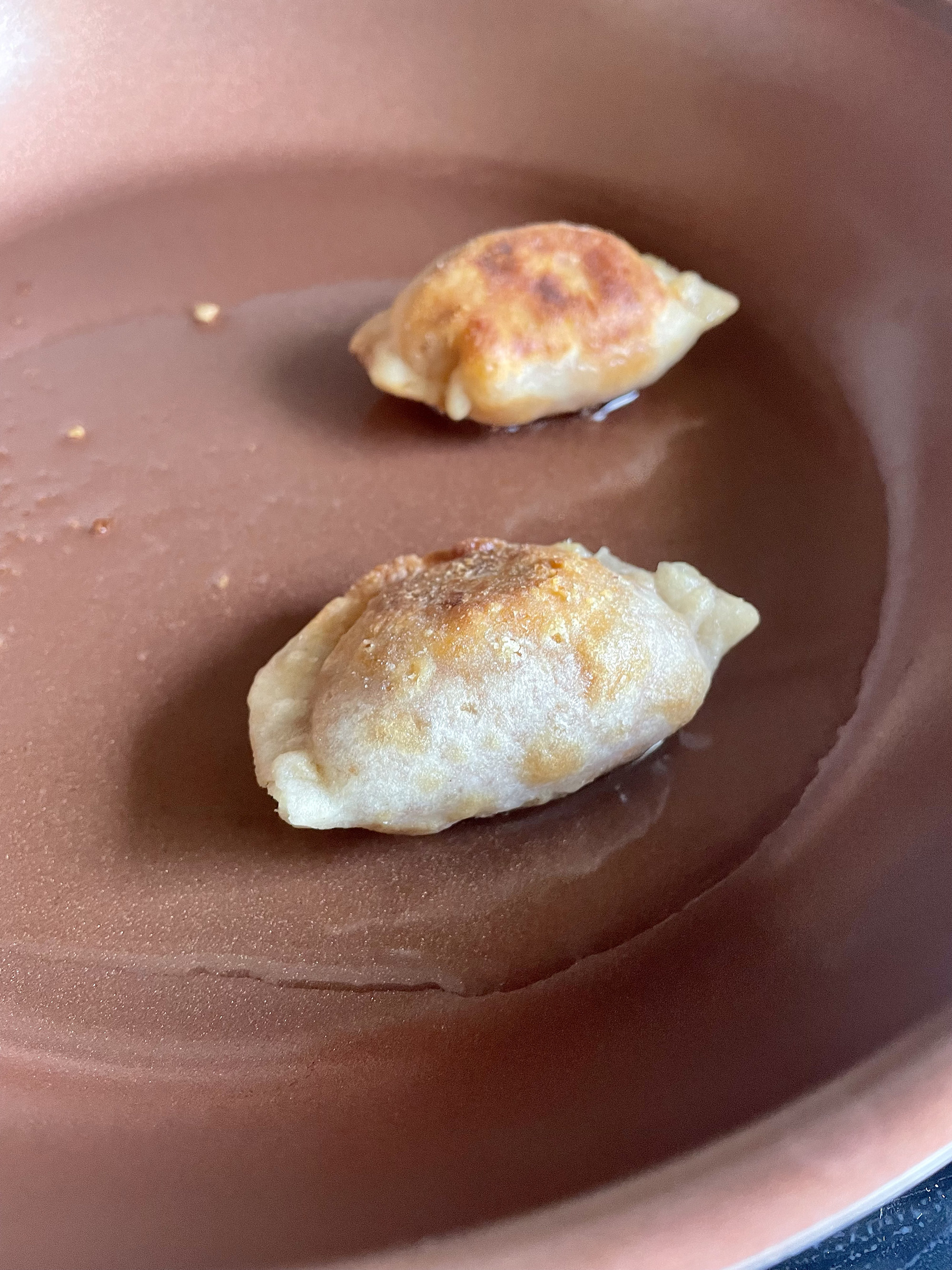 Two empanadas on a plate