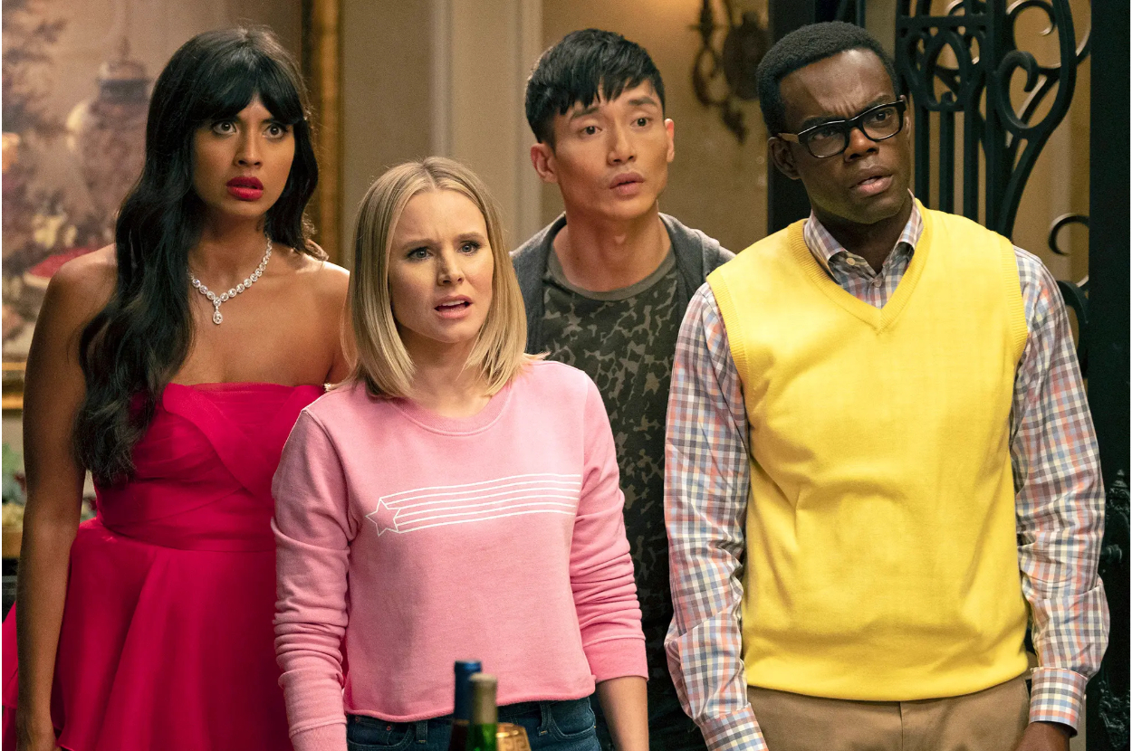 Jameela Jamil, Kristen Bell, Manny Jacinto, and William Jackson Harper appear surprised in a scene from &quot;The Good Place.&quot;