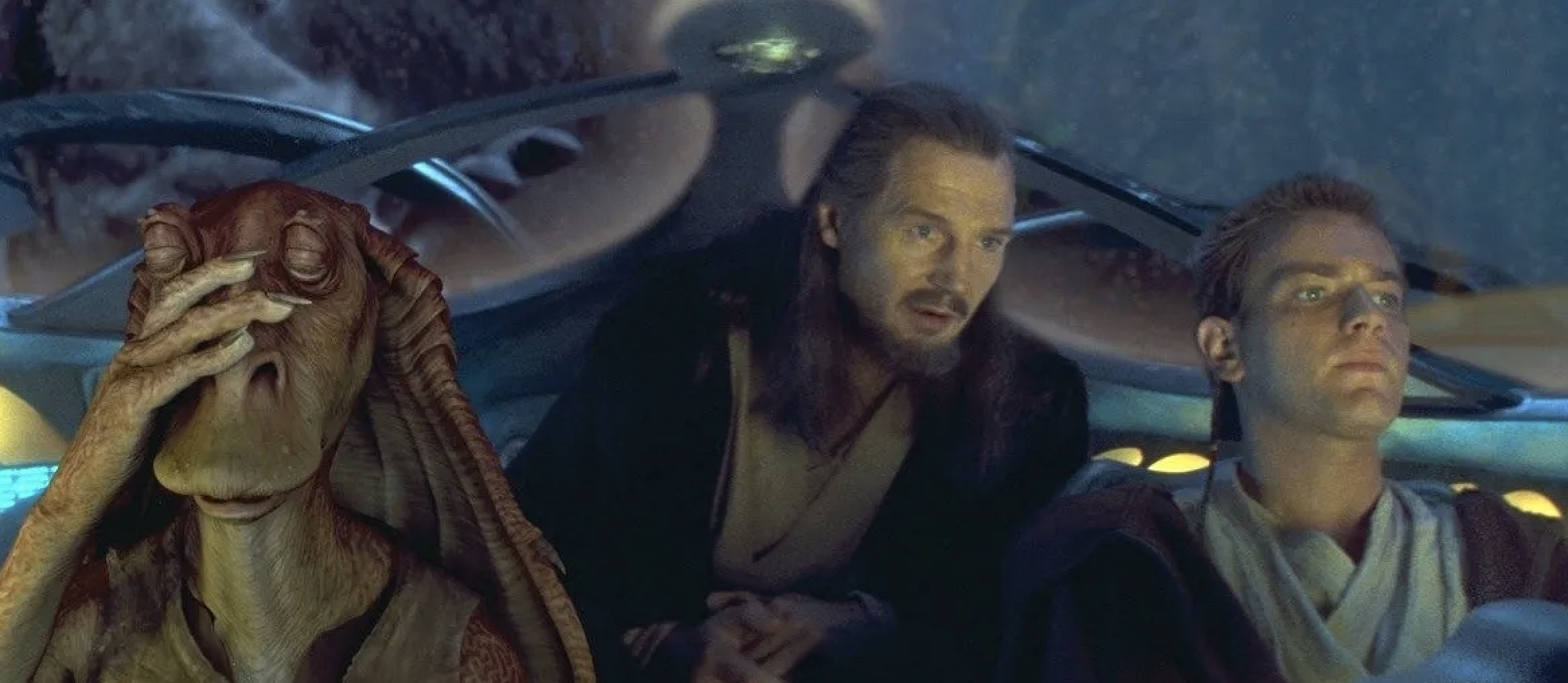 Jar Jar Binks, Qui-Gon Jinn, and Obi-Wan Kenobi are in a spacecraft cockpit, appearing tense and focused