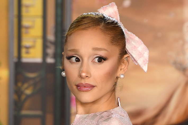 Ariana Grande looks to the side at the "Wicked" LA premiere red carpet