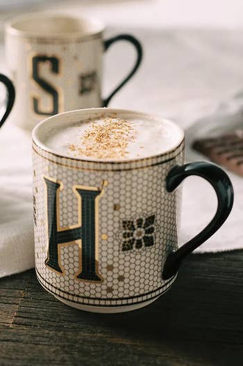 a tile monogrammed mug with the letter 