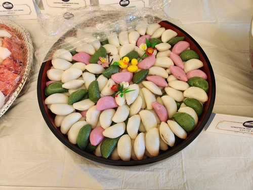 Songpyeon, a half-moon-shaped stuffed rice cake, is placed at the first-ever White House reception celebrating Chuseok, the Korean autumn harvest celebration, in Washington on Sept. 17, 2024. (Yonhap)