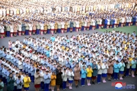 Local flood victims return home from Pyongyang