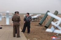 (LEAD) N. Korea preparing for additional troop deployment, suicide drone supply to Russia: Seoul