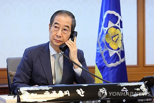 Acting president's phone talk with Japanese PM