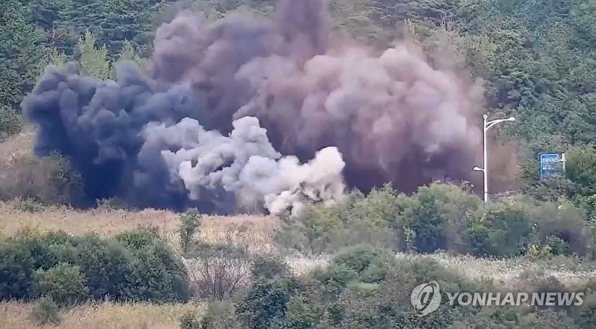 This image, captured from footage provided by South Korea's Joint Chiefs of Staff on Oct. 15, 2024, shows North Korea blowing up parts of the Donghae road connected to South Korea earlier in the day. (PHOTO NOT FOR SALE) (Yonhap)