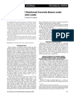 Shear Strength of Reinforced Concrete Beams Under Uniformly Distributed Loads