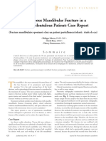 Spontaneous Mandibular Fracture in A Partially Edentulous Patient: Case Report