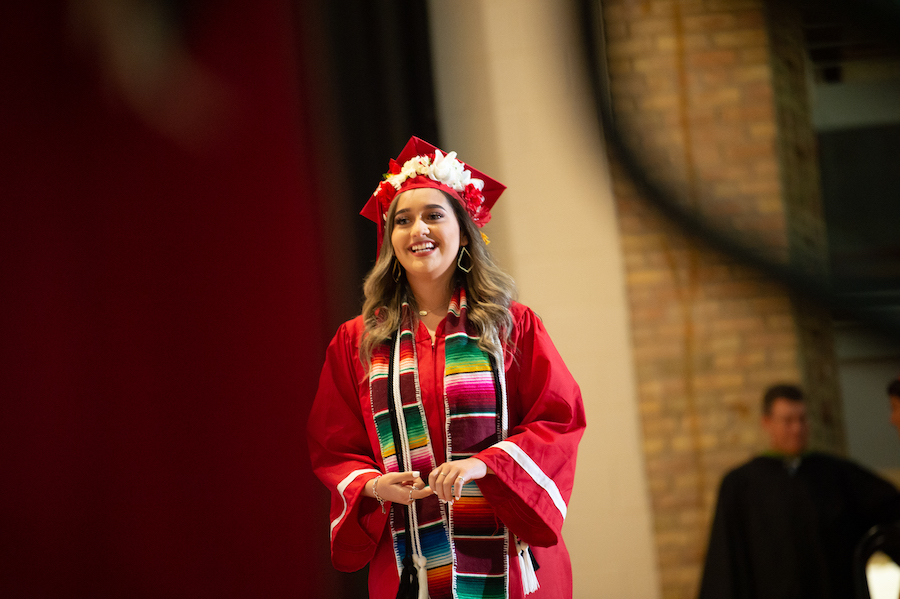 Student at graduation ceremony in robe and tassle