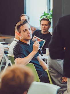 A guy speaking on mic