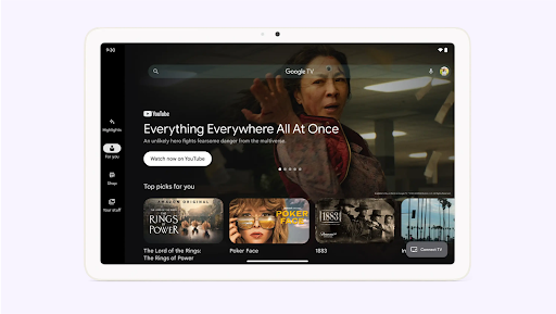 A tablet screen displaying the Google TV homepage, with top picks of shows, movies and YouTube videos.