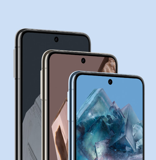 Three Pixel 8 Pros in various colors. They stand behind one another. Their homescreens are on, showing off the smooth, scratch-resistant glass.