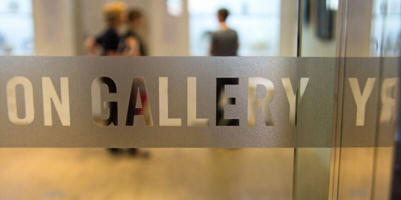 Looking through a window into the gallery