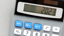 "2023" on calculator display