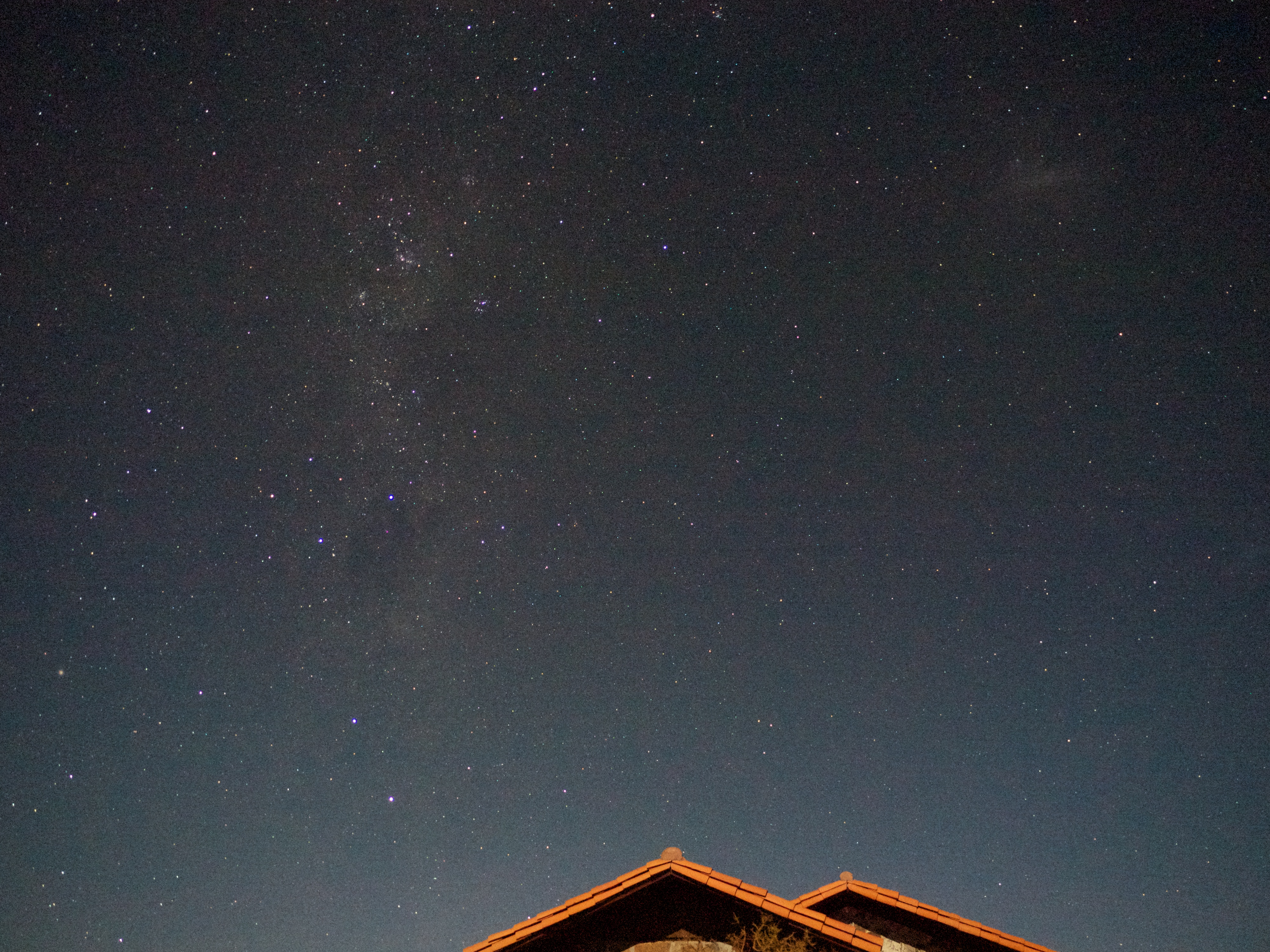 The southern hemisphere Milky Way and Large Magellanic Cloud, over the main LCO building.