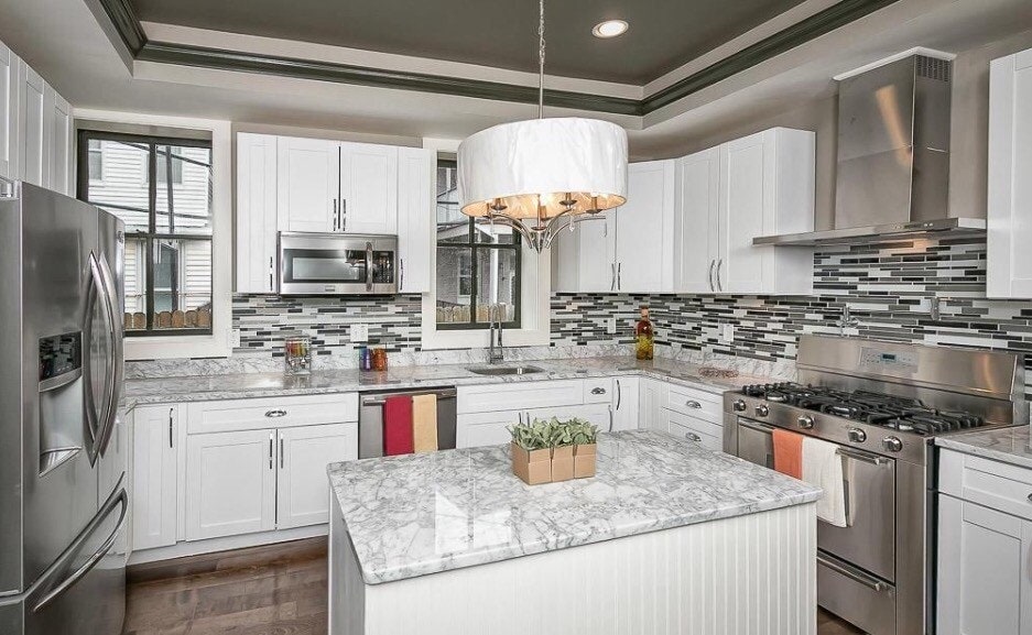 Kitchen of a townhome in Baltimore Maryland with marble countertops.