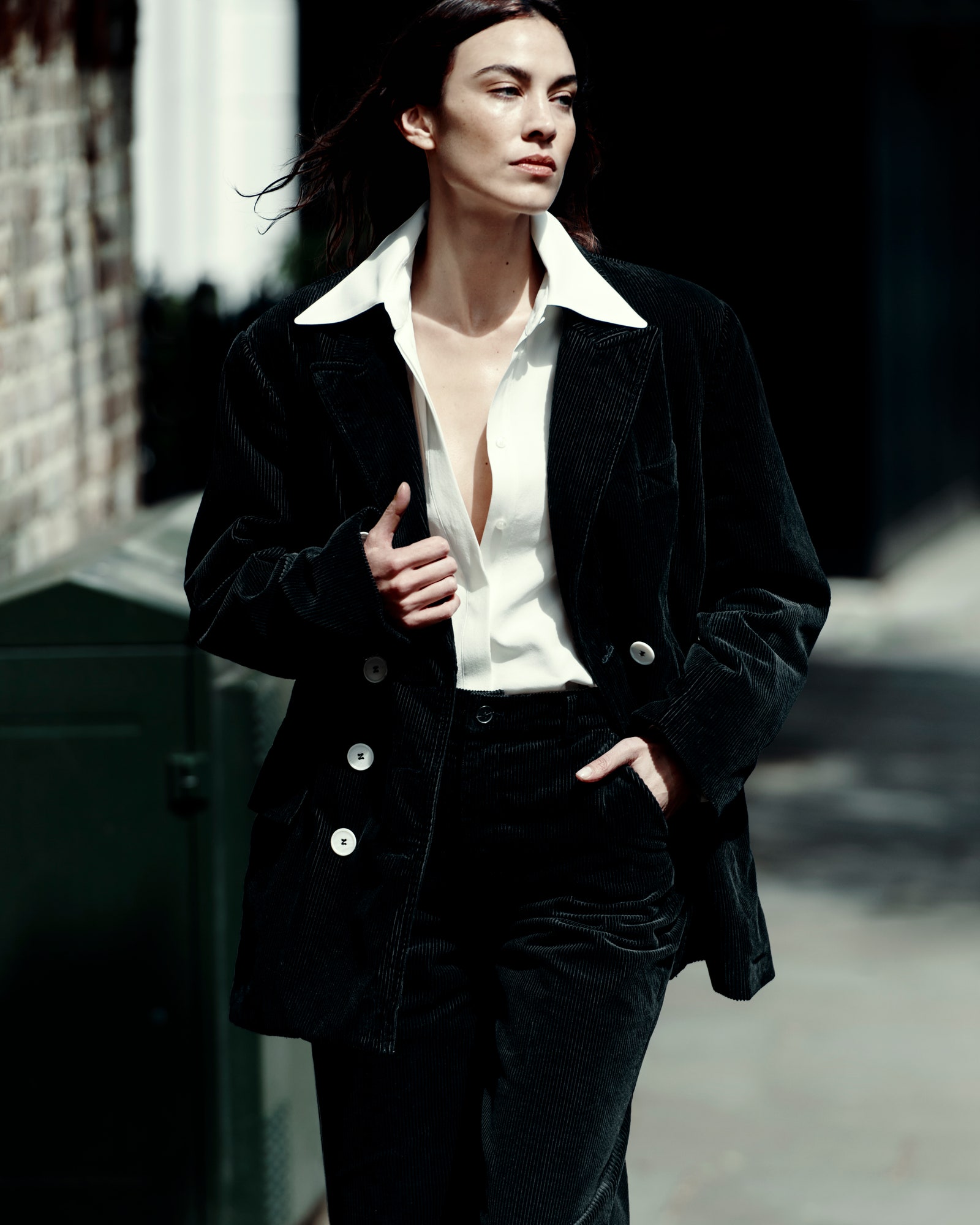 Image may contain Alexa Chung Blazer Clothing Coat Jacket Formal Wear Suit Adult Person and Overcoat