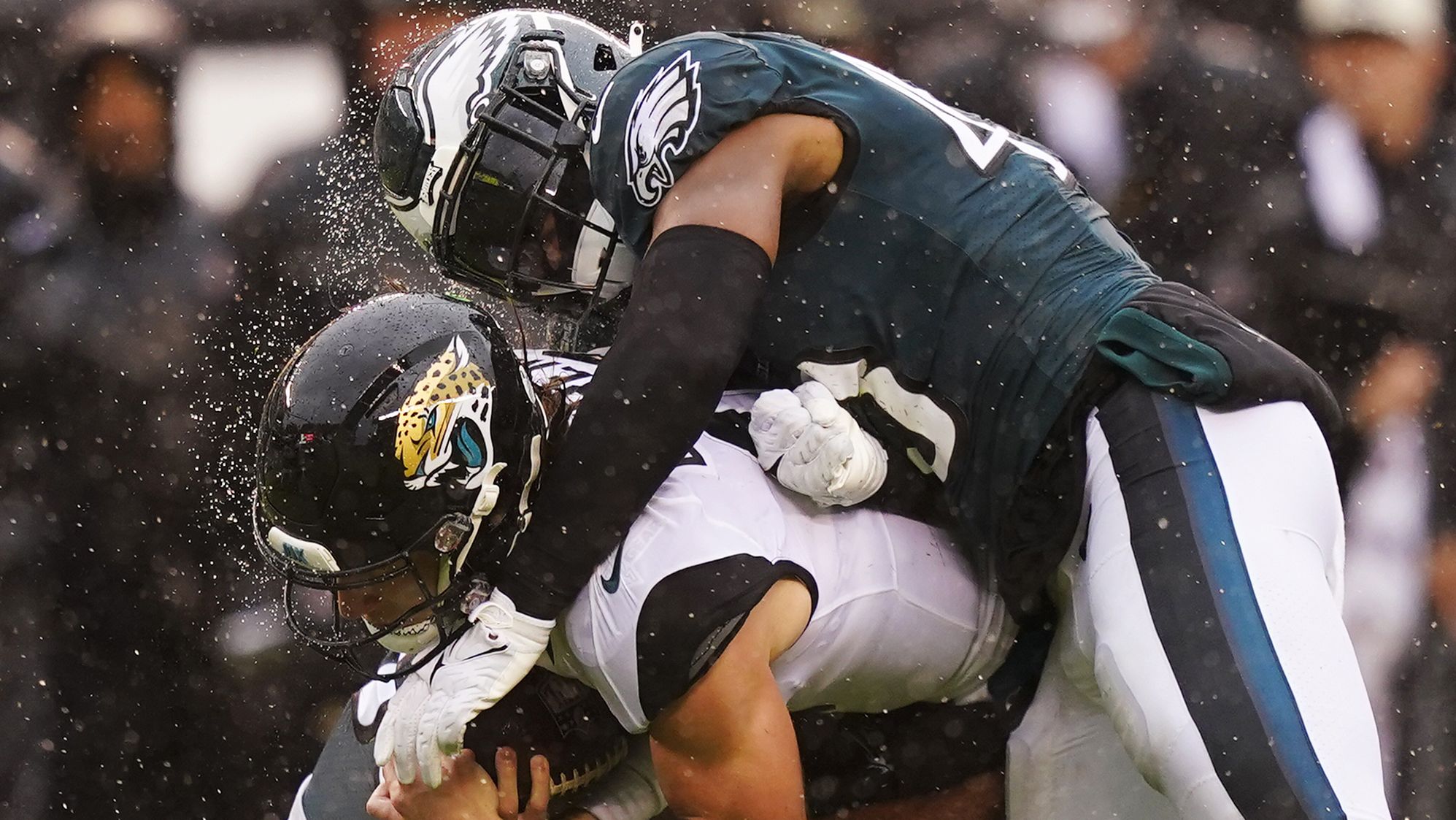 Jacksonville Jaguars quarterback Trevor Lawrence is brought down by Philadelphia Eagles linebacker Kyzir White in the second half of the Eagles' 29-21 win in Philly. The Eagles are now 4-0 after Week 4.